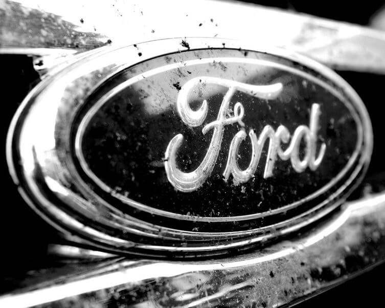 FORD GEARS DOWN IN RESTRUCTURING BID